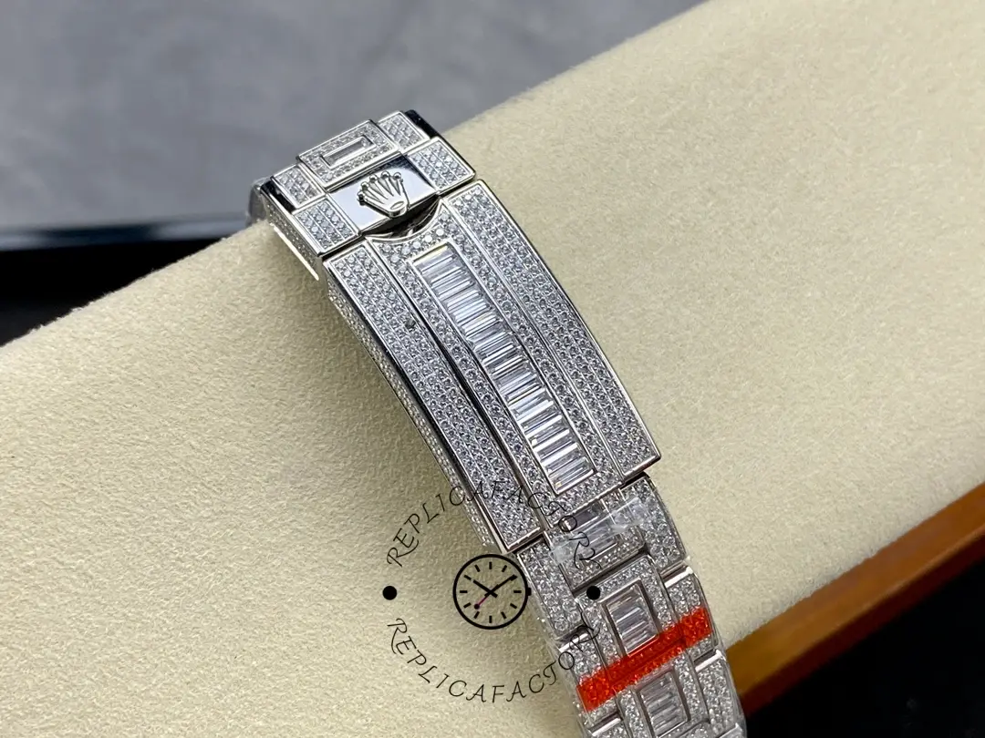 Clasp detail of the Rolex GMT Master AMG 126710BLRO showing bracelet engraving and finish.