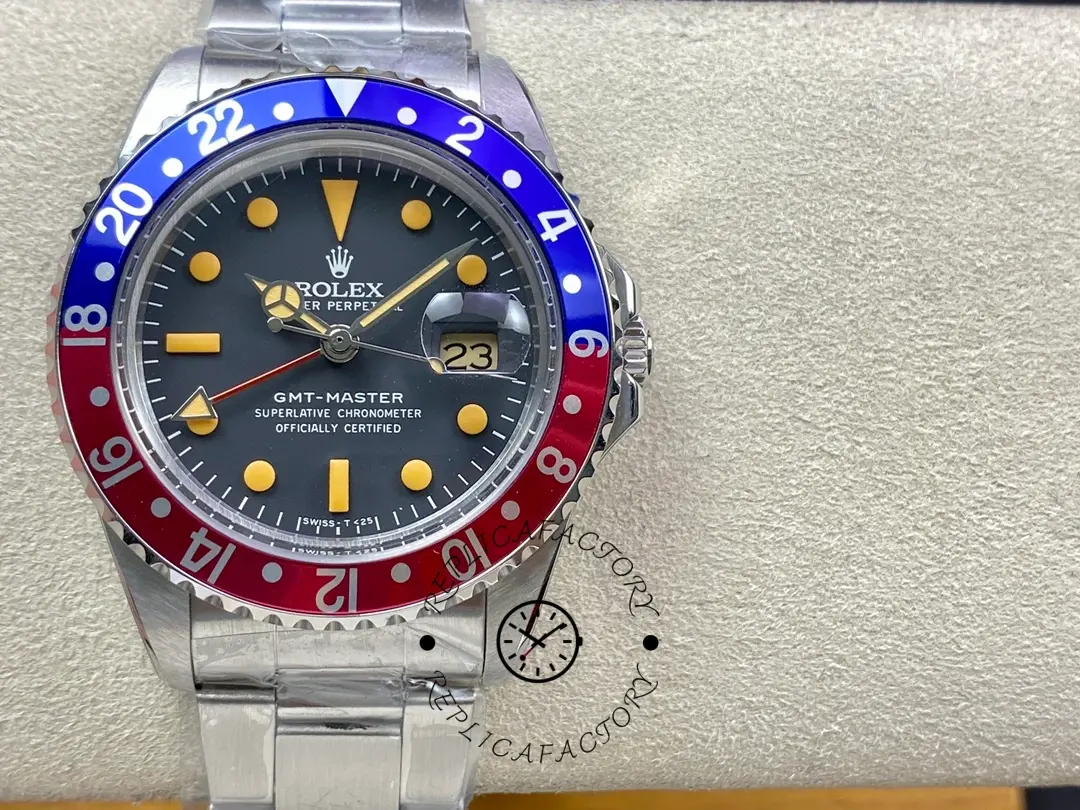 Rolex GMT-Master II 16710, on cushion front view showing Pepsi bezel and black dial.