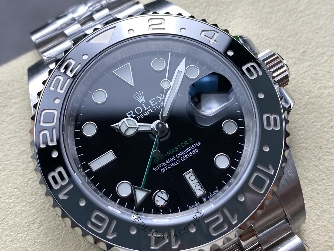 Rolex GMT-Master II M126710GRNR 0003, dial macro showing markers, GMT hand, and date.