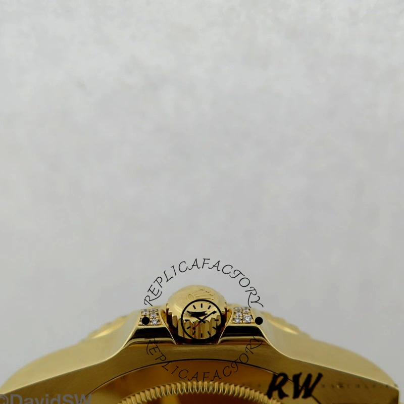 Crown-side macro of the Rolex GMT-Master II 116758 showing the gold crown and case edge.