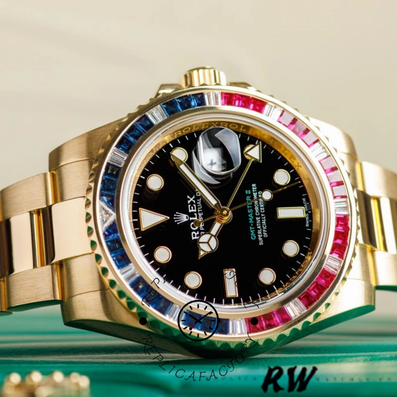 Rolex GMT-Master II 116758 on green surface, black dial and gem bezel, yellow gold bracelet.
