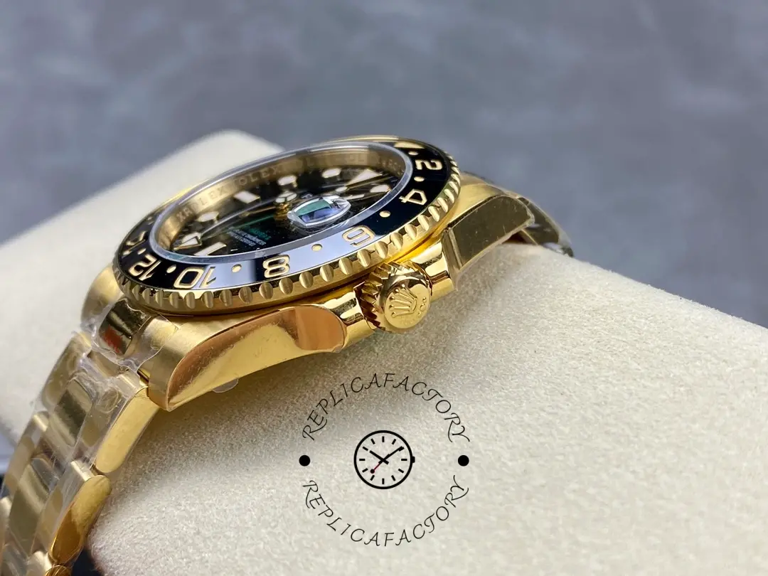 Side angle of Rolex GMT-Master II 116718LN showing gold case flank and bezel profile.