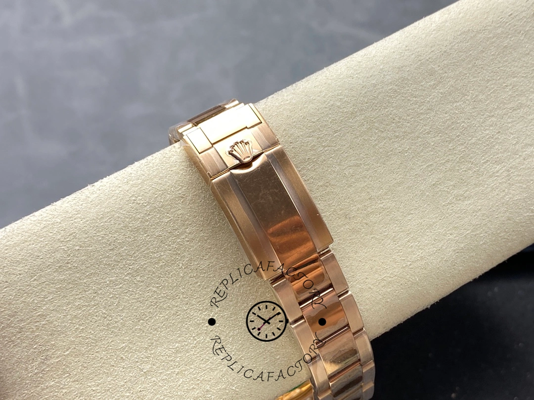 Bracelet clasp on wrist roll of Rolex GMT-Master II 126715CHNR showing bracelet finish.