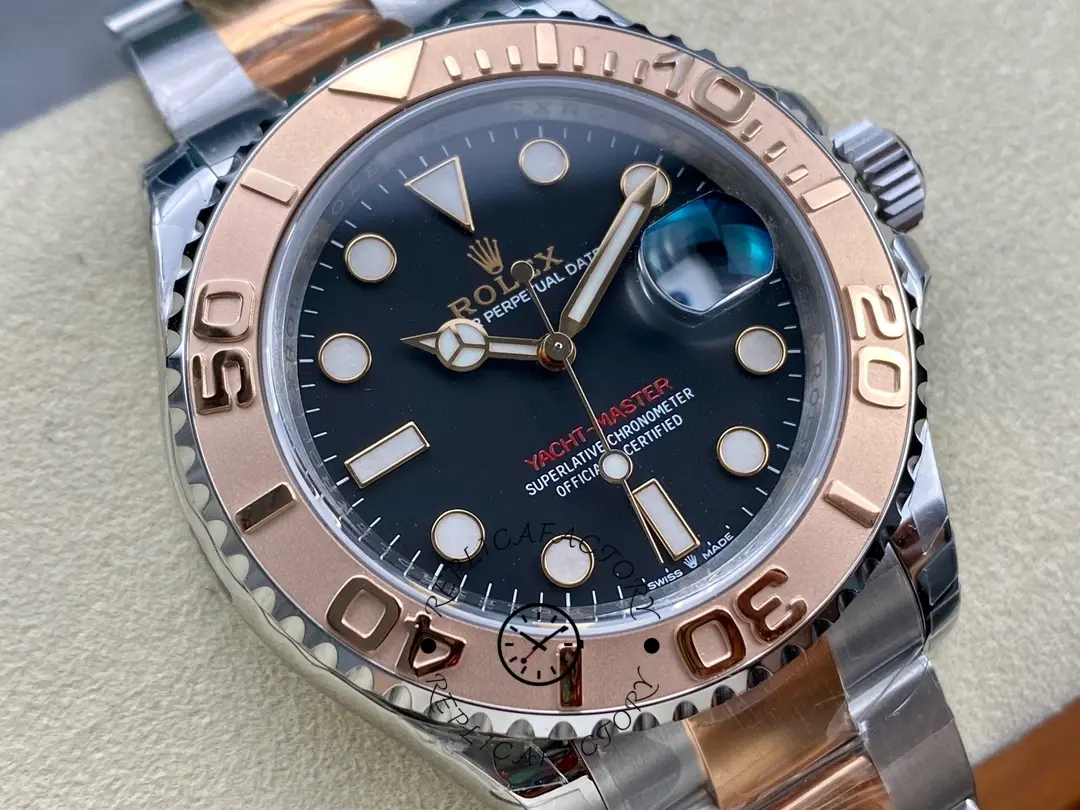 Rolex Yacht-Master 126621 dial close-up, black dial markers and hands, Everose bezel numerals.