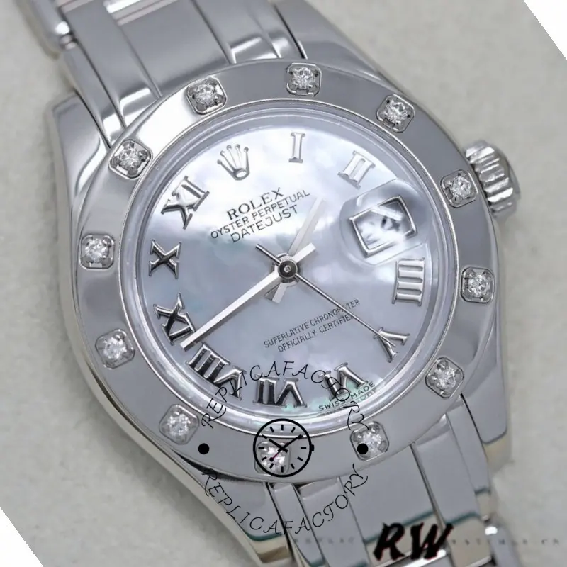 Dial close-up of Rolex Pearlmaster 80319 showing MOP Roman numerals and hands.