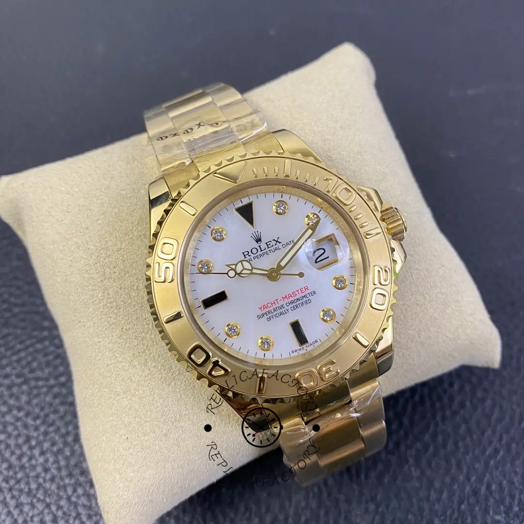 Rolex Yacht-Master 168628, angled front view showing bezel and lugs, yellow gold, 35mm.