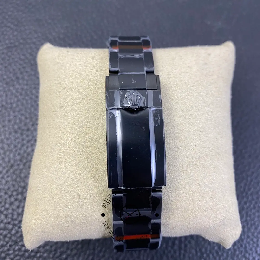 Rolex Yacht-Master 116622, bracelet clasp close-up on cushion showing clasp closed.