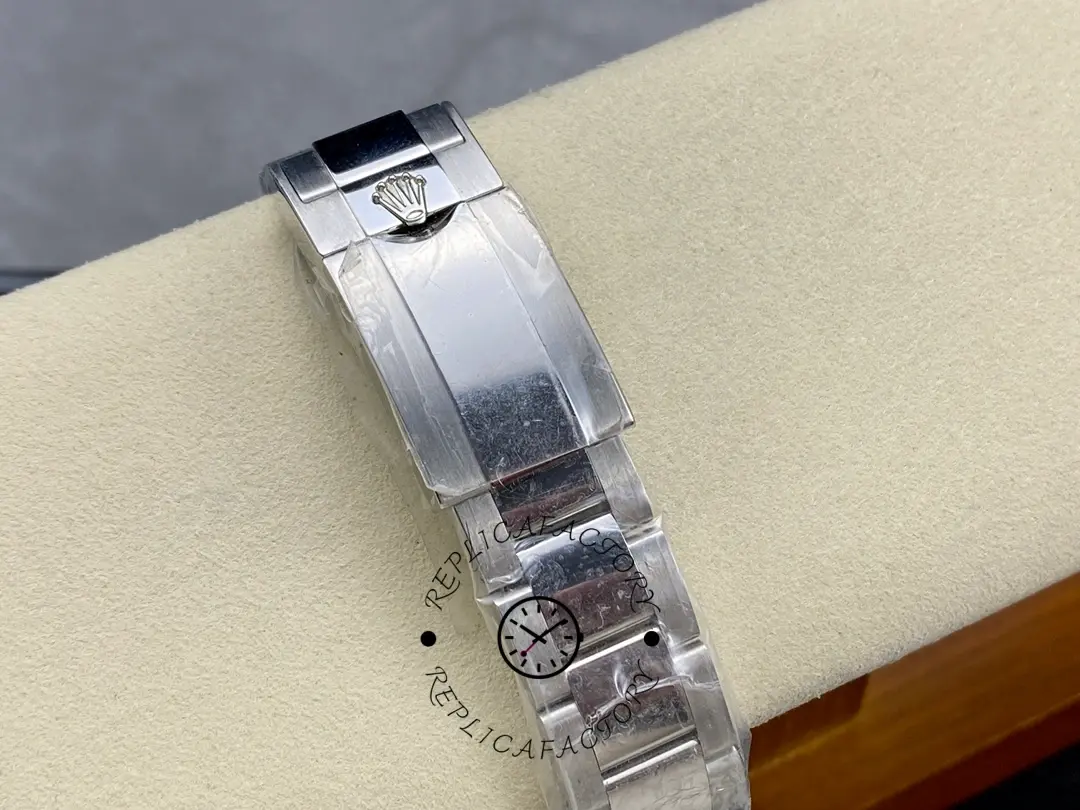 Rolex Yacht-Master II 116680, bracelet clasp view on cushion showing clasp closed.
