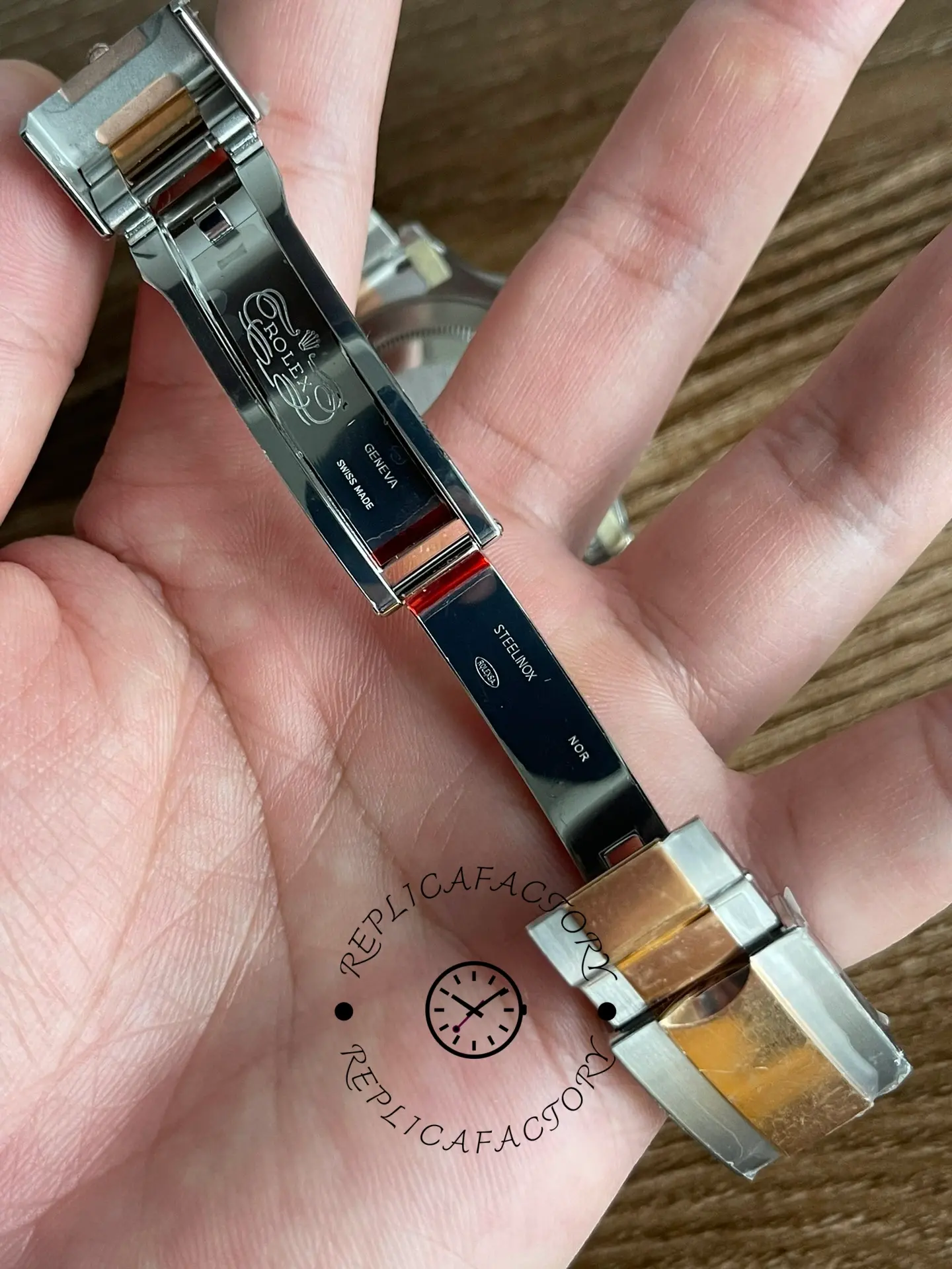 Rolex Yacht-Master 126621 bracelet underside close-up, clasp mechanism and links, palm shot.