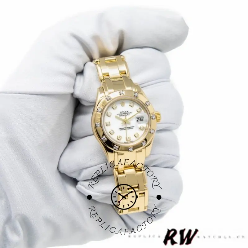 Rolex Pearlmaster 80318 held in hand, close view of the white dial and gold bracelet.