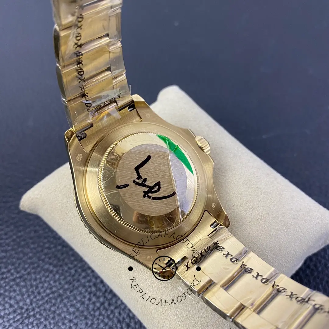 Rolex Yacht-Master 168628, caseback view showing engraved back and bracelet, yellow gold.