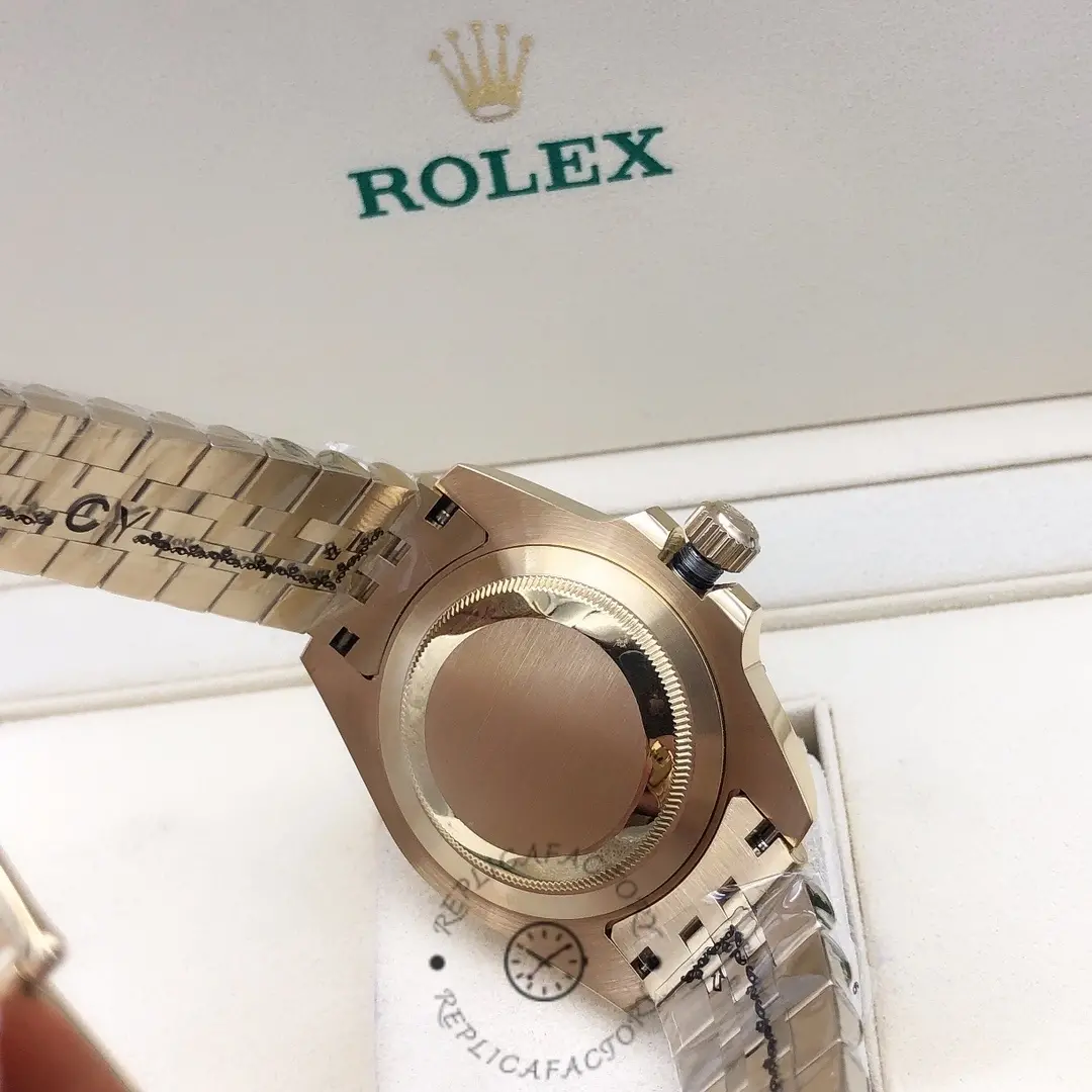 Caseback view of the Rolex GMT Master II m126718grnr 0002 showing solid back and end links.