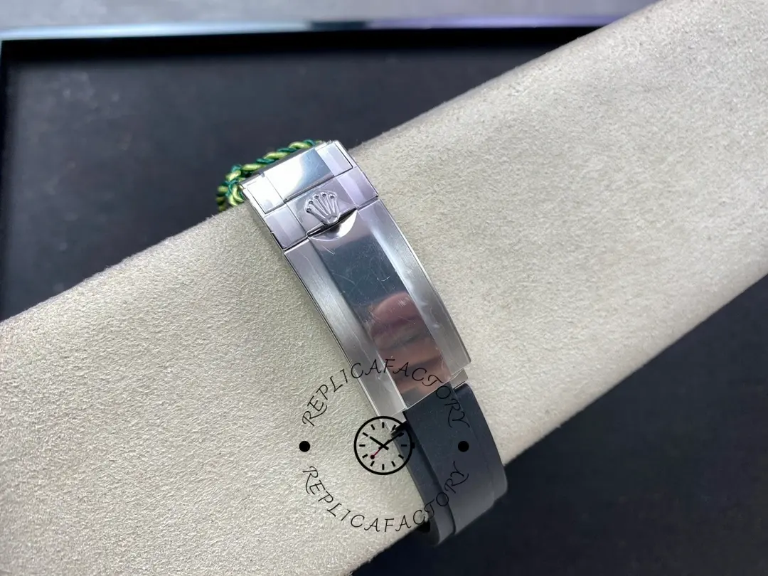 Rolex Yacht-Master 226679TBR clasp close-up, strap buckle and metal clasp detail, on cushion.