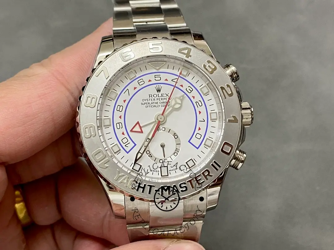 Handheld front view of Rolex Yacht-Master II 116689, white dial and bezel.