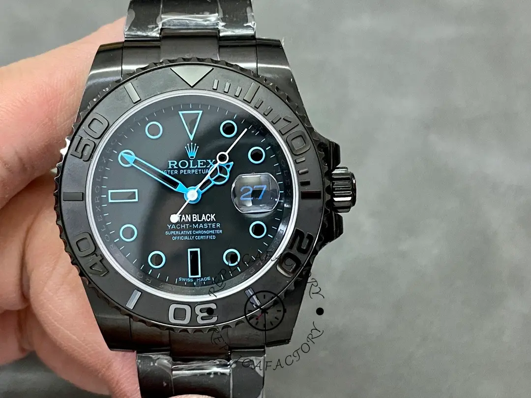 Rolex Yacht-Master 126622-0002, close-up of black dial with blue markers and hands.