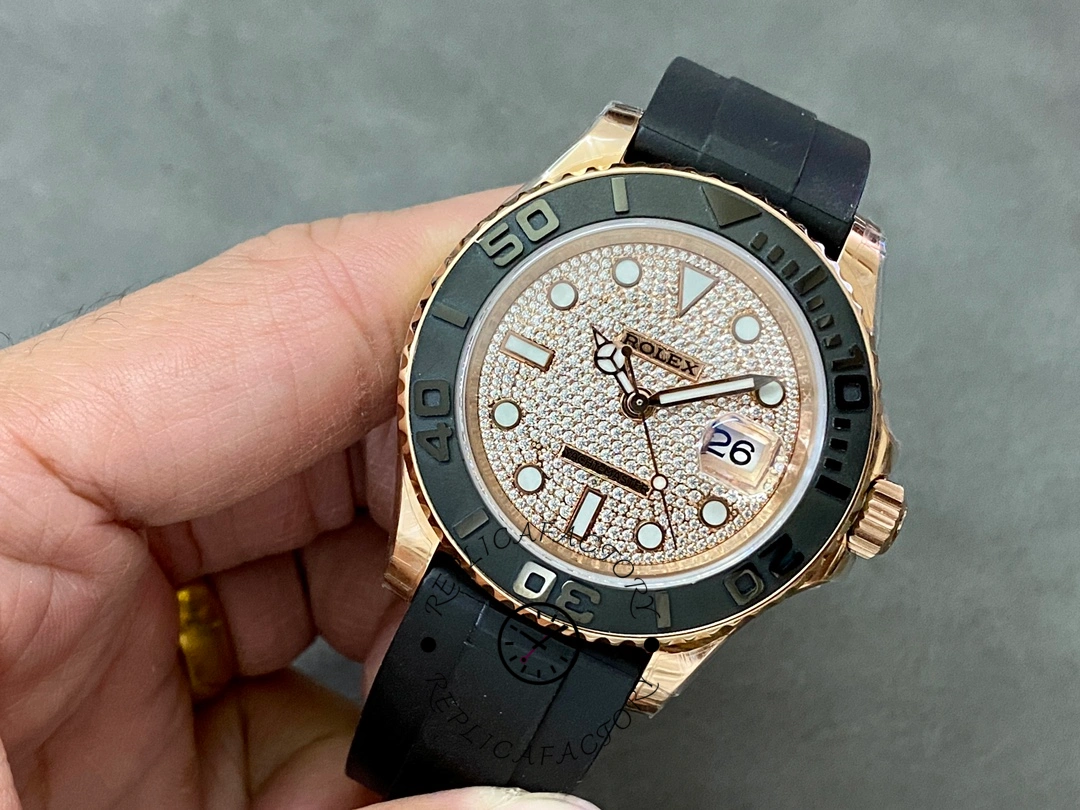 Rolex Yacht-Master 126655 full side view, Everose case and bezel, black Oysterflex strap, product shot.