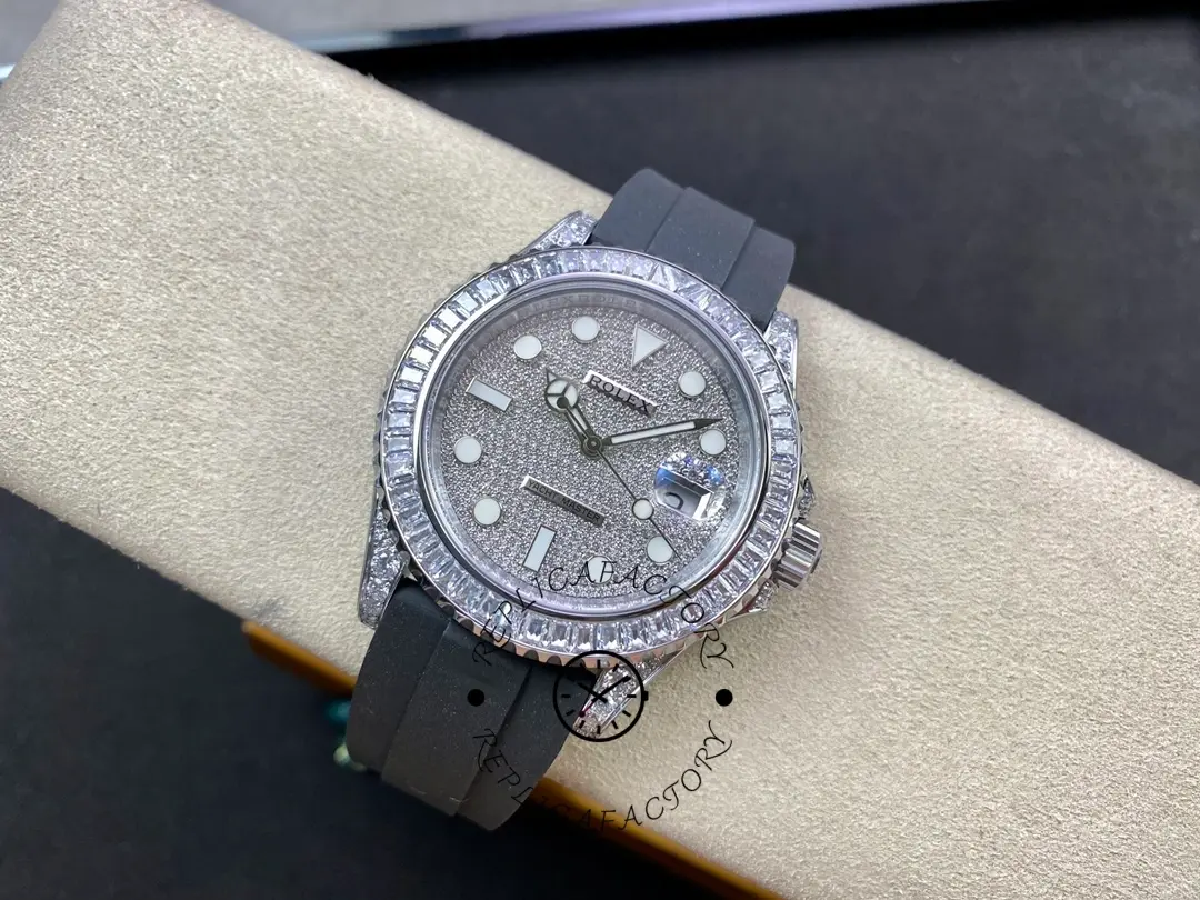 Rolex Yacht-Master 226679TBR top view on cushion, grey dial, baguette diamond bezel, black strap.