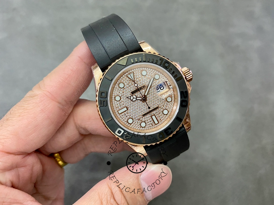 Rolex Yacht-Master 126655 held in hand, top view of pavé dial and Everose bezel.