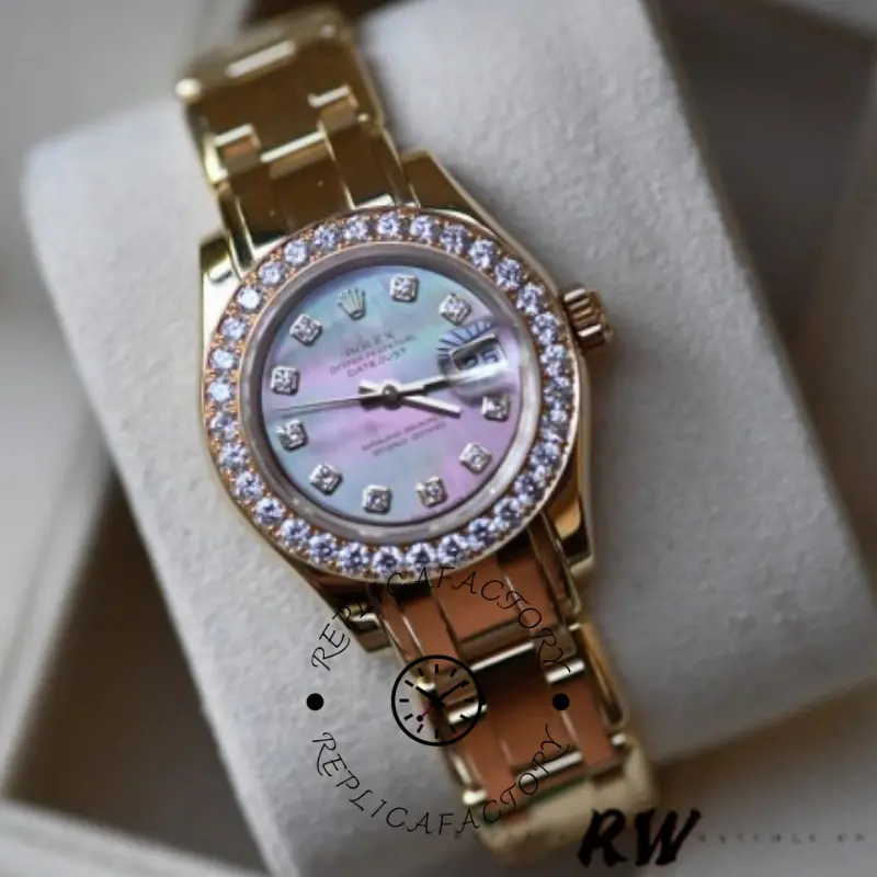 Front on-cushion view of Rolex Pearlmaster 80298 showing MOP dial color and diamond bezel.