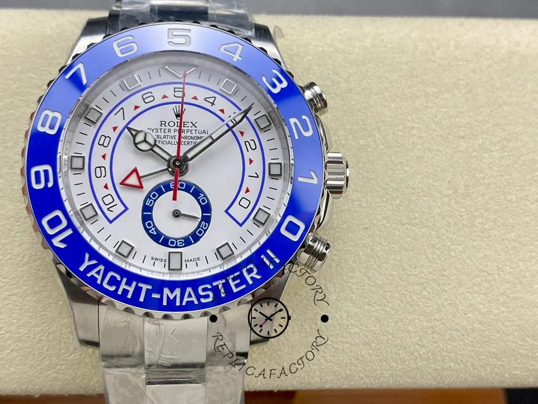 Rolex Yacht-Master II 116680, front view on cushion showing white dial and blue bezel.