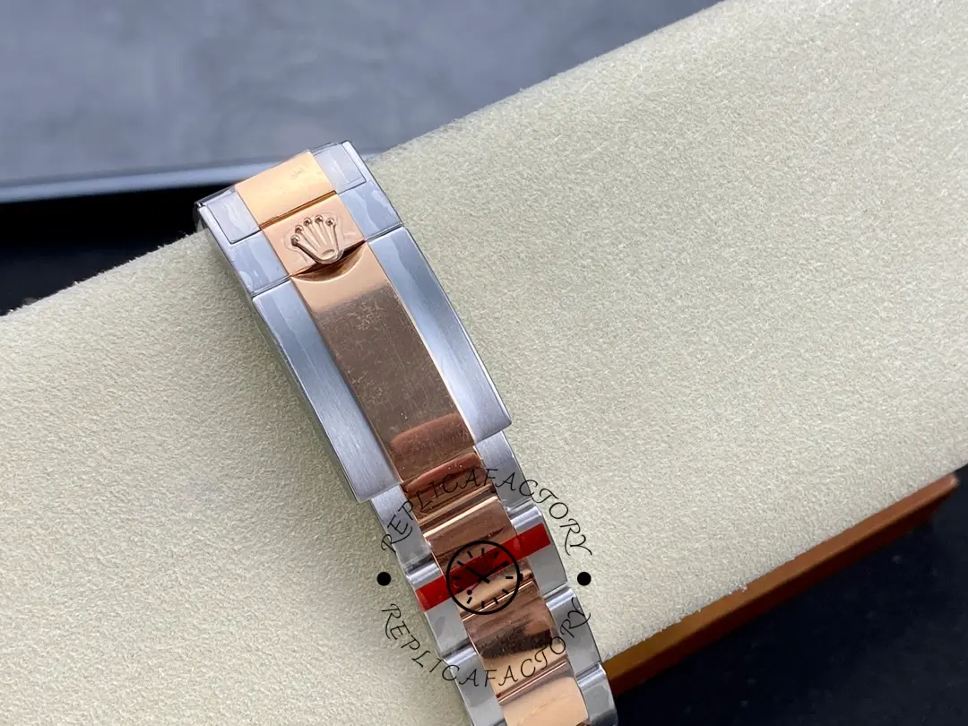 Rolex Yacht-Master 126621 bracelet underside view, clasp and links on cushion.