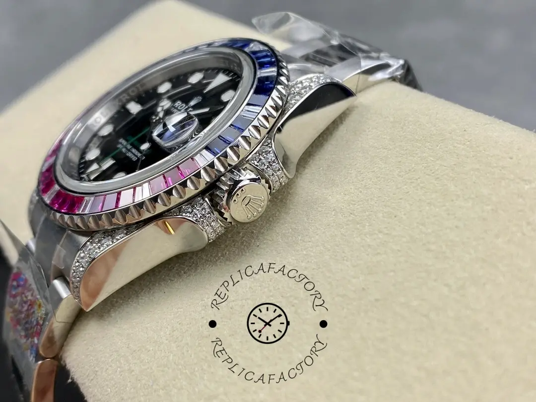 Rolex GMT-Master II 126710BLRO crown-side view on wrist rest, case profile and gem-set bezel.