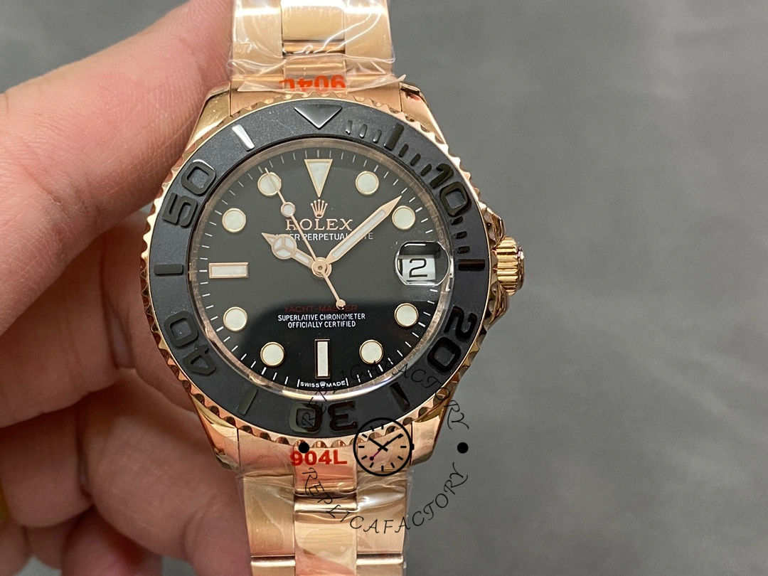 Front view of Rolex Yacht-Master m268655, black dial and bezel, held in hand.
