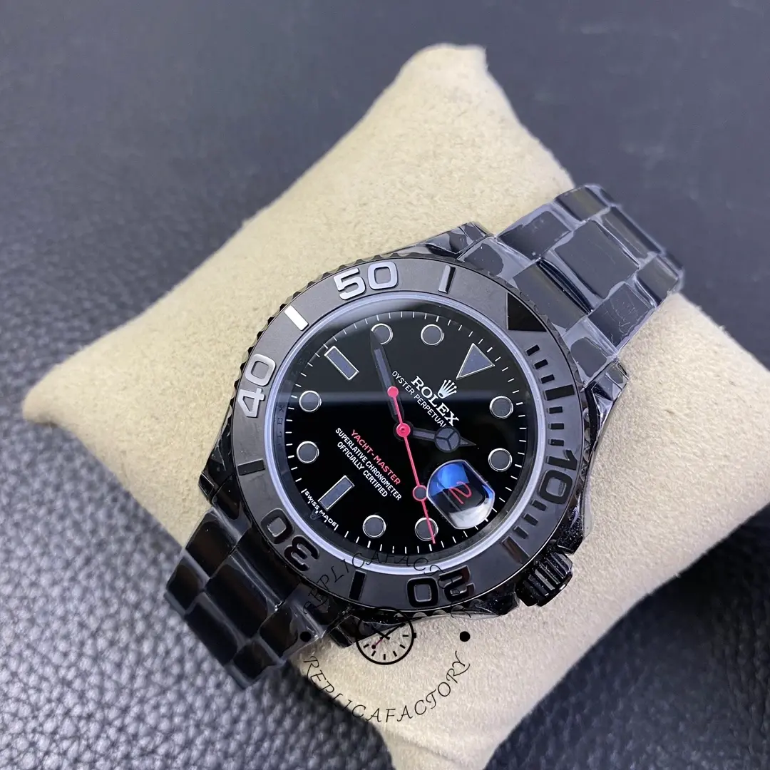 Rolex Yacht-Master 116622, three-quarter view showing bezel and bracelet on cushion.