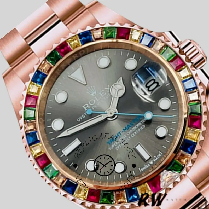 Angled close-up of the Rolex Yacht-Master 116695 showing hands, markers, and rainbow bezel.