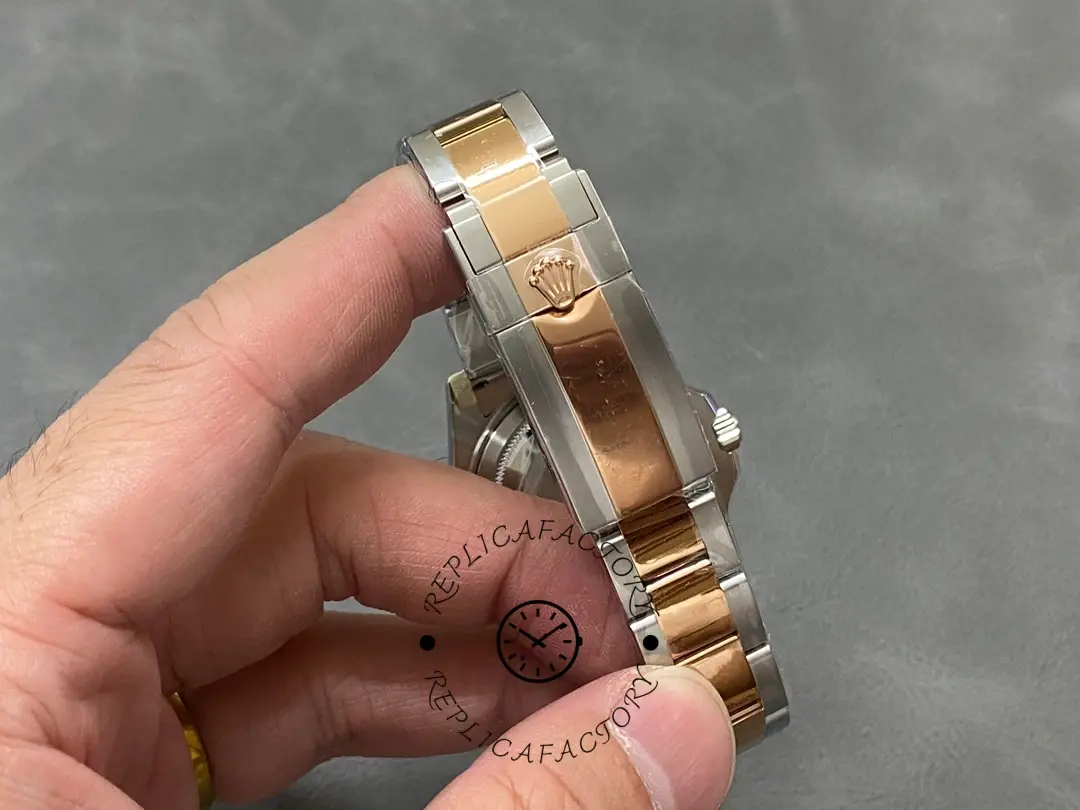 Rolex Yacht-Master 268621 clasp close-up, clasp and link finishing detail, in hand.