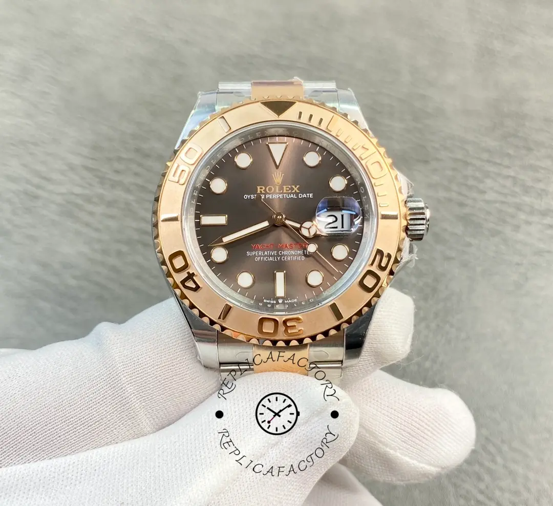 Gloved hand holding Rolex Yacht-Master 116621, front view of dial.