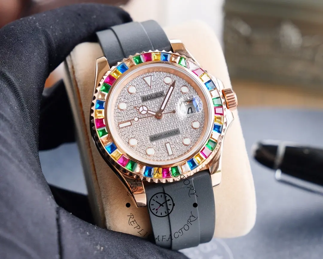 Wrist close-up of the Rolex Yacht-Master 116695SATS showing diamond dial, hands, and bezel stones.