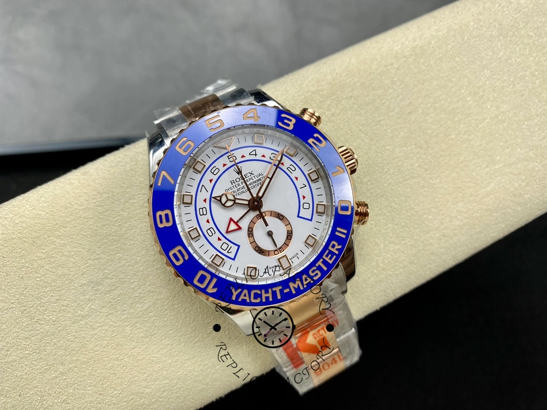 Angled front view of the Rolex Yacht-Master II 116681 on pillow, bezel and dial shown.