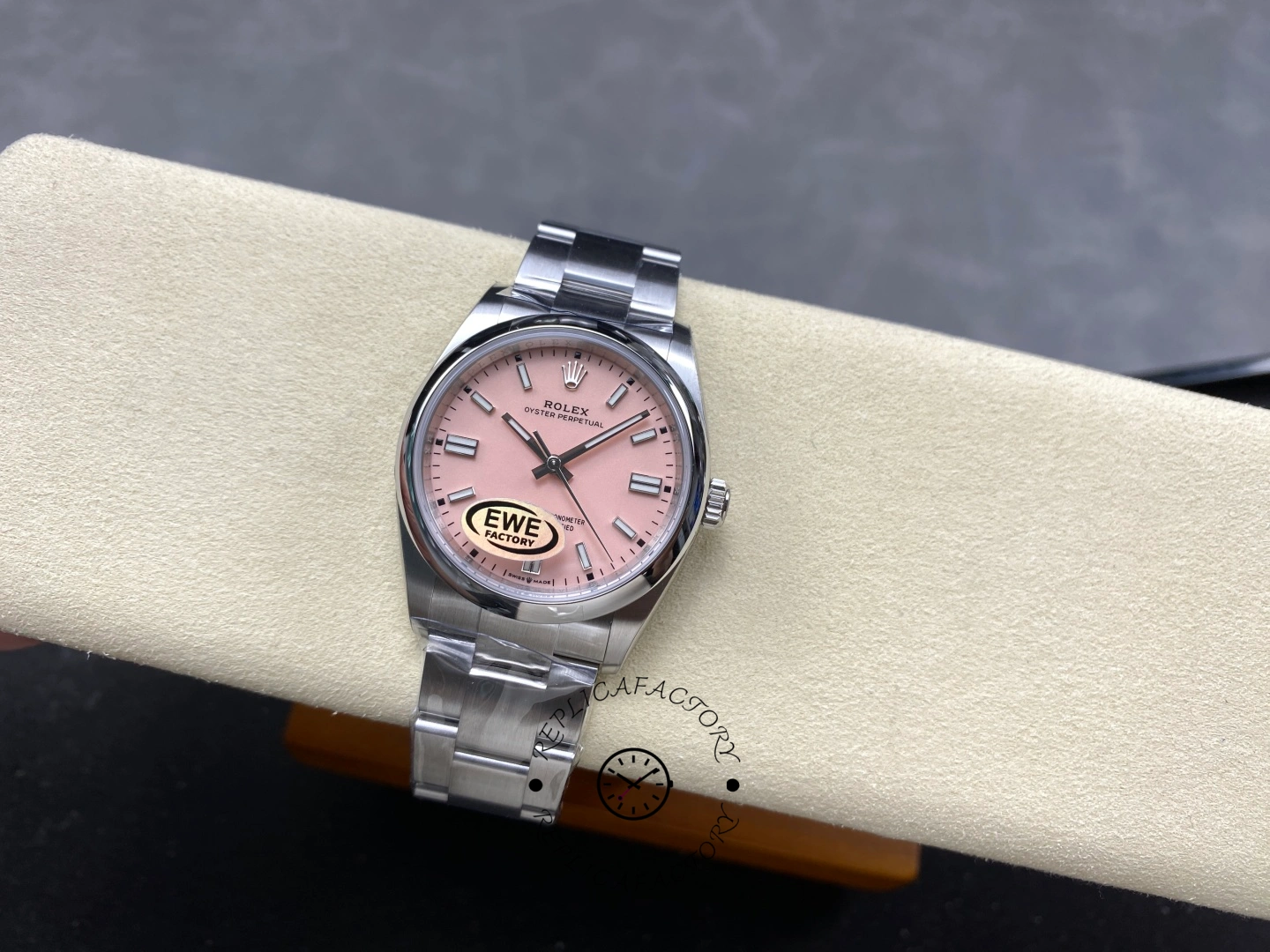 Rolex Oyster Perpetual 31 m277200-0009 wrist-side view, full watch on cushion.
