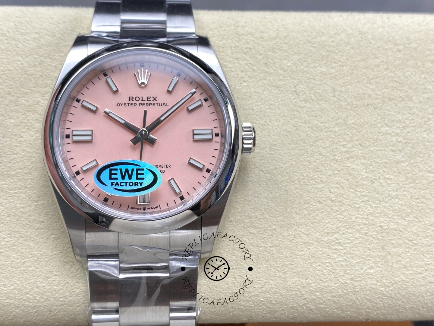Rolex Oyster Perpetual 31 m277200-0009 on cushion, pink dial, stainless steel bracelet.