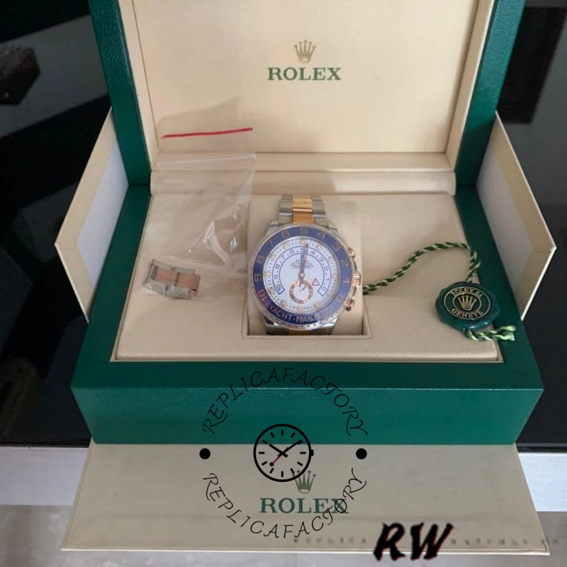 Rolex Yacht-Master II 116681 in box display, watch on pillow with green box backdrop.