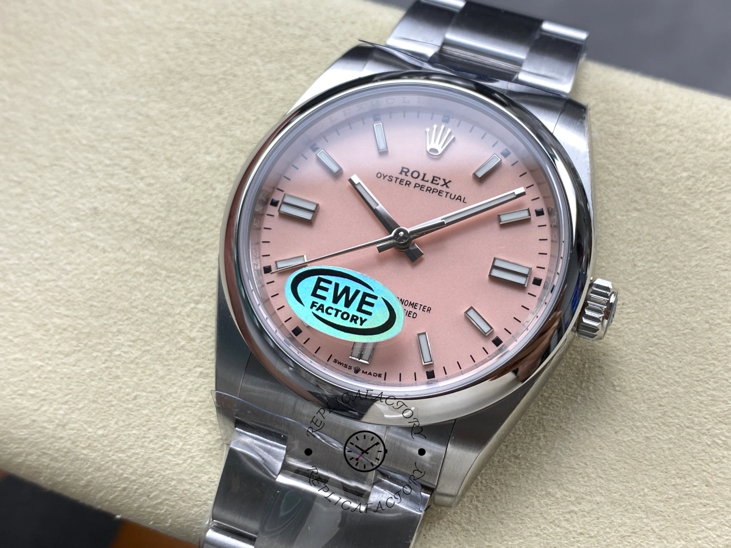 Rolex Oyster Perpetual 31 m277200-0009 front view on cushion, pink dial and smooth bezel.