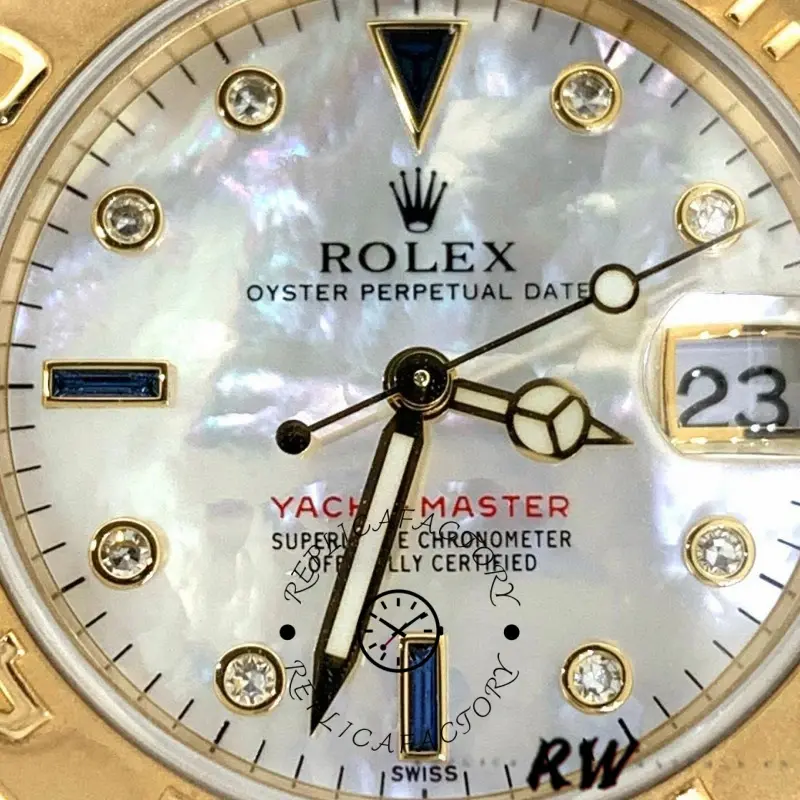 Rolex Yacht-Master 168628 dial close-up, white MOP dial texture and date window, markers detail.