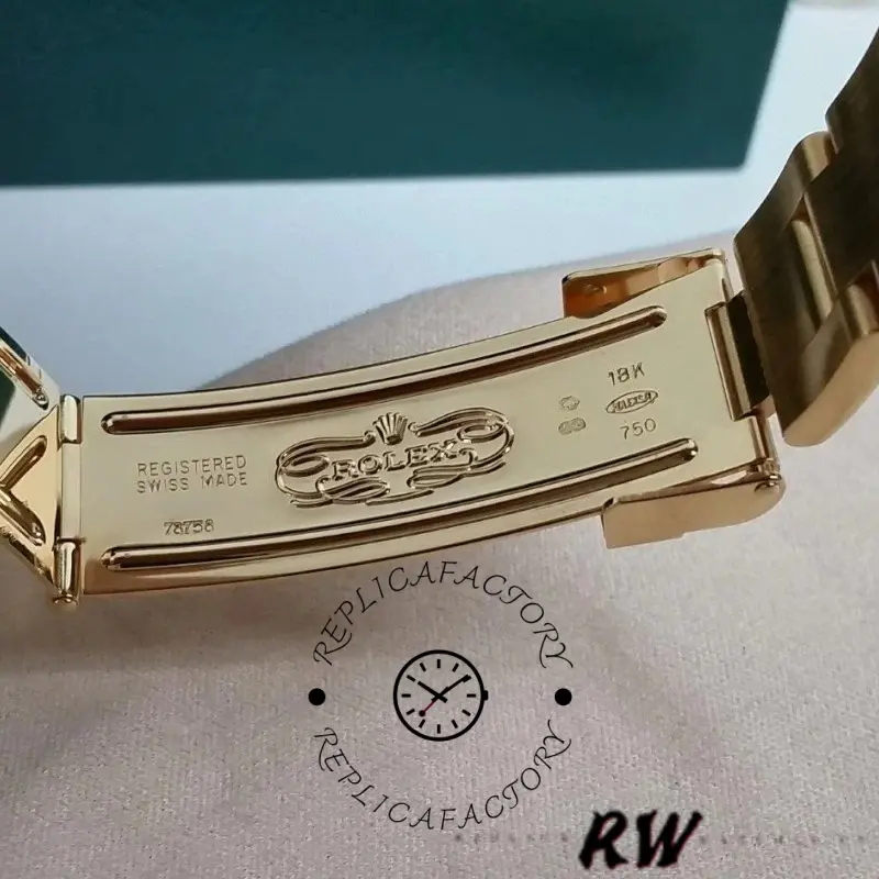 Clasp engraving close-up of the Rolex Yacht-Master 169628 showing gold clasp markings.