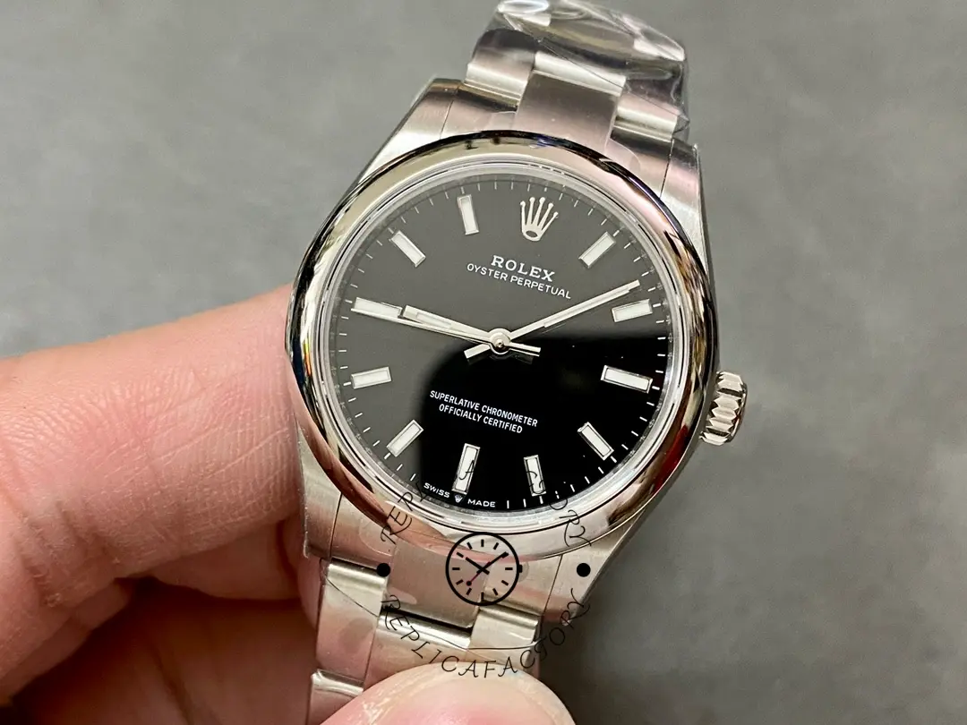 Rolex Oyster Perpetual 31 277200-0002 close-up, black dial and bezel edge, bracelet shown.