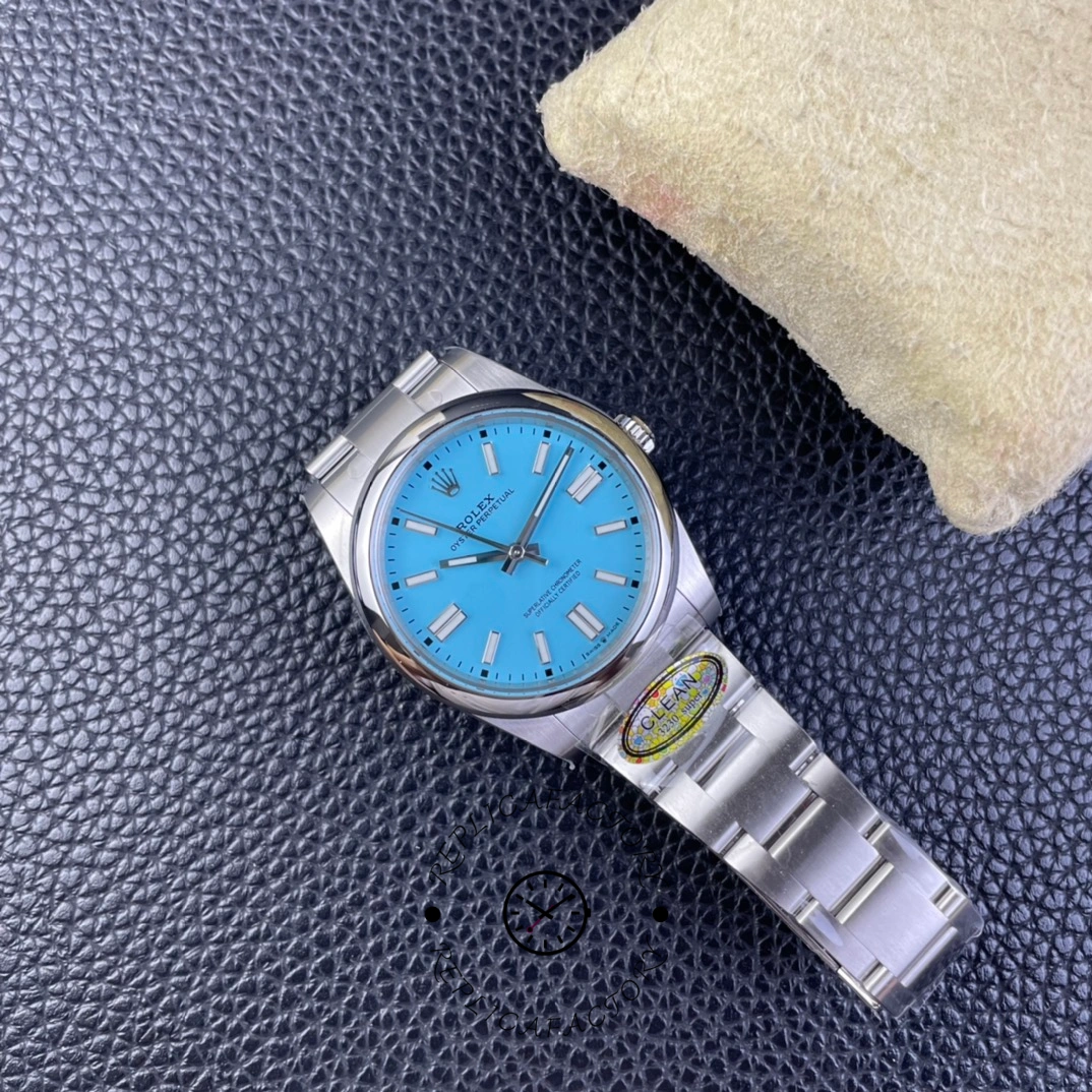 Rolex Oyster Perpetual 41 m124300 0006, small full view showing watch centered on pillow.