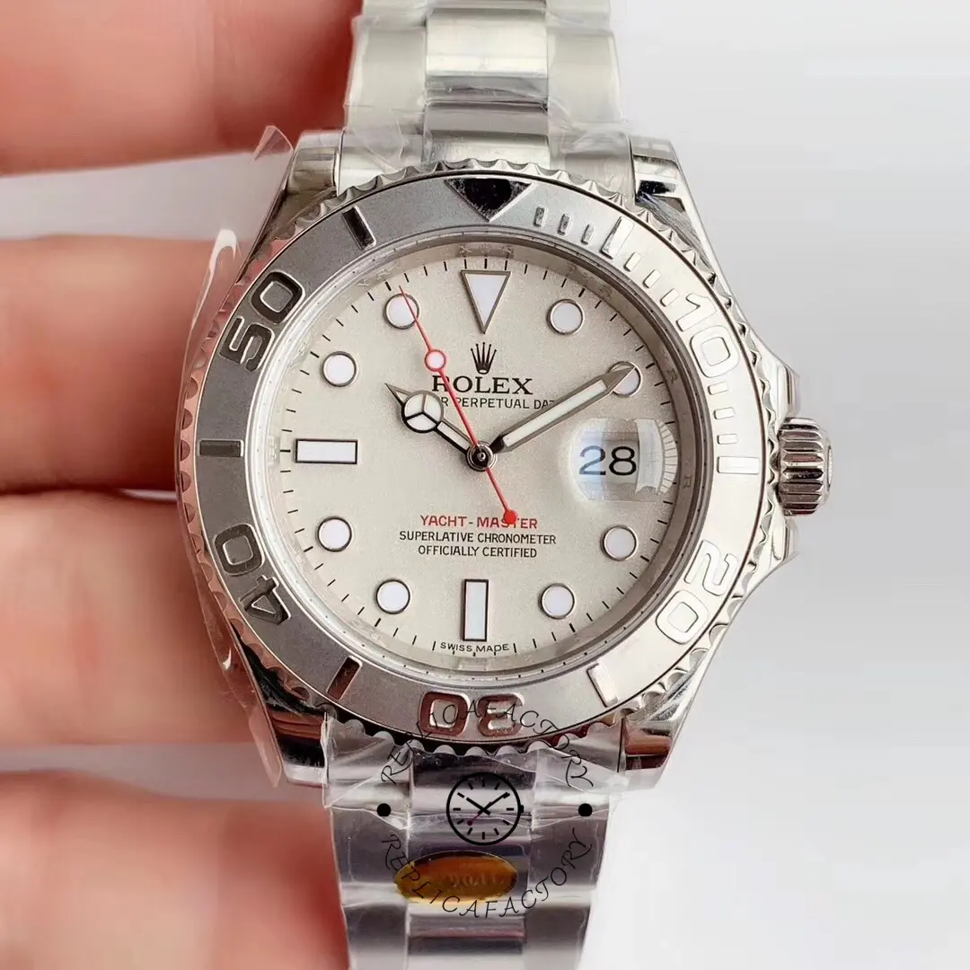 Rolex Yacht-Master 16622, hand-held front view showing silver dial and bezel.