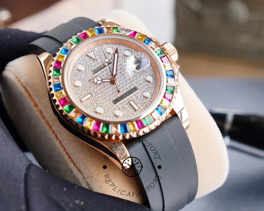 Glove-held angled view of the Rolex Yacht-Master 116695SATS showing bezel stones and case edge.