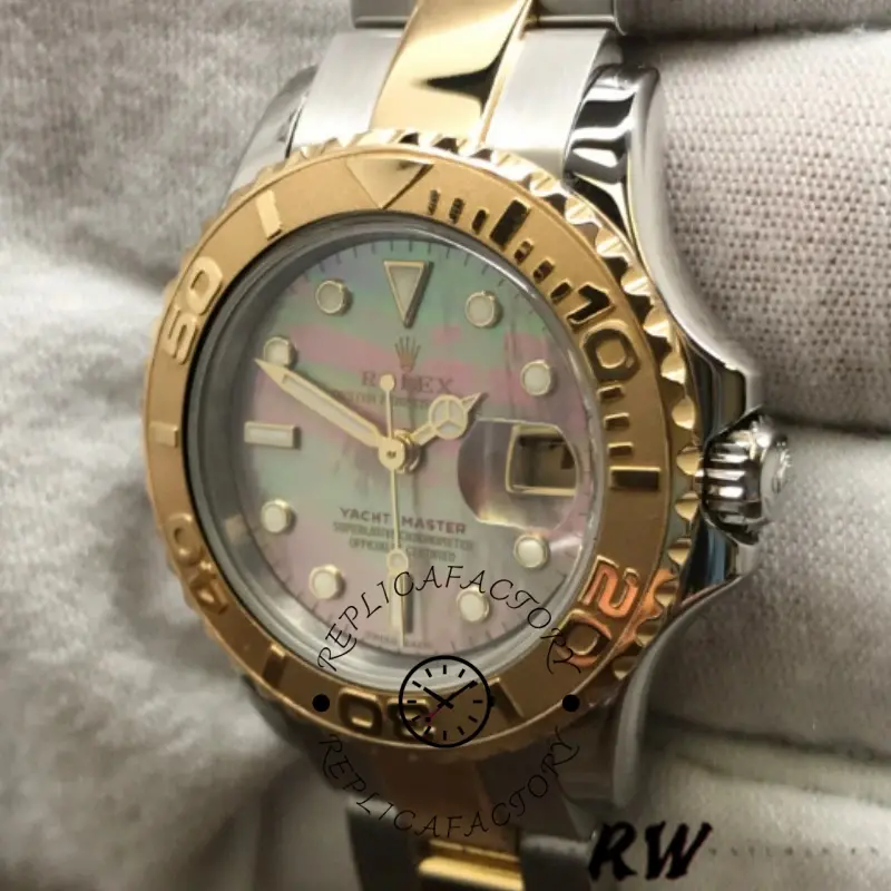 Rolex Yacht-Master 169623 side angle, case profile and bezel edge, two-tone bracelet shown.