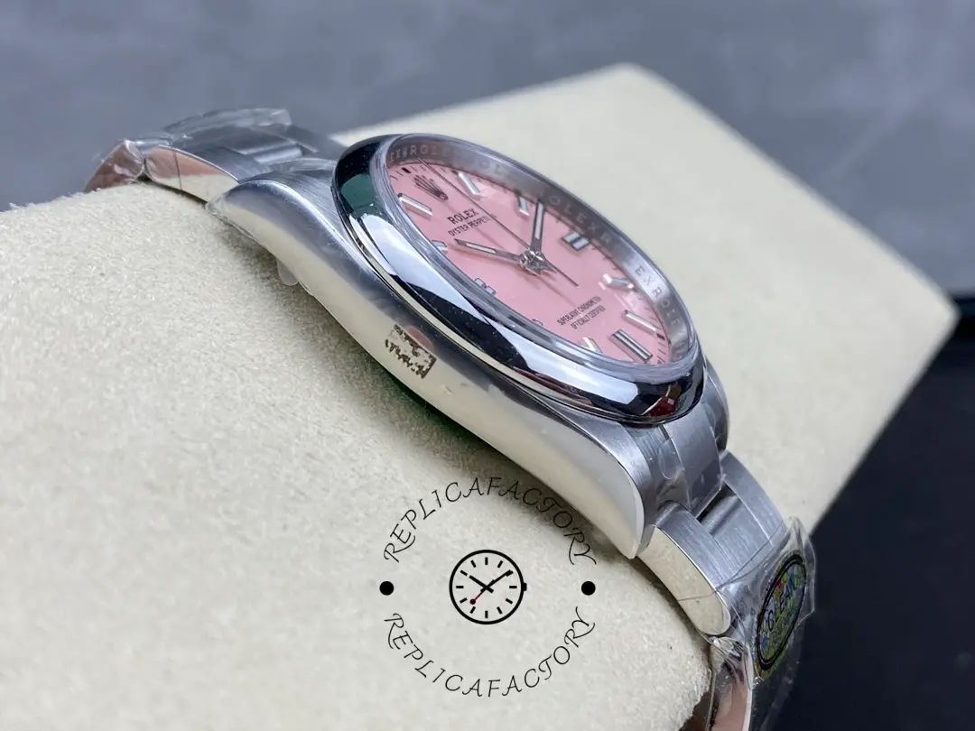 Rolex Oyster Perpetual 126000-0008, pink dial, low side view of case and bracelet.