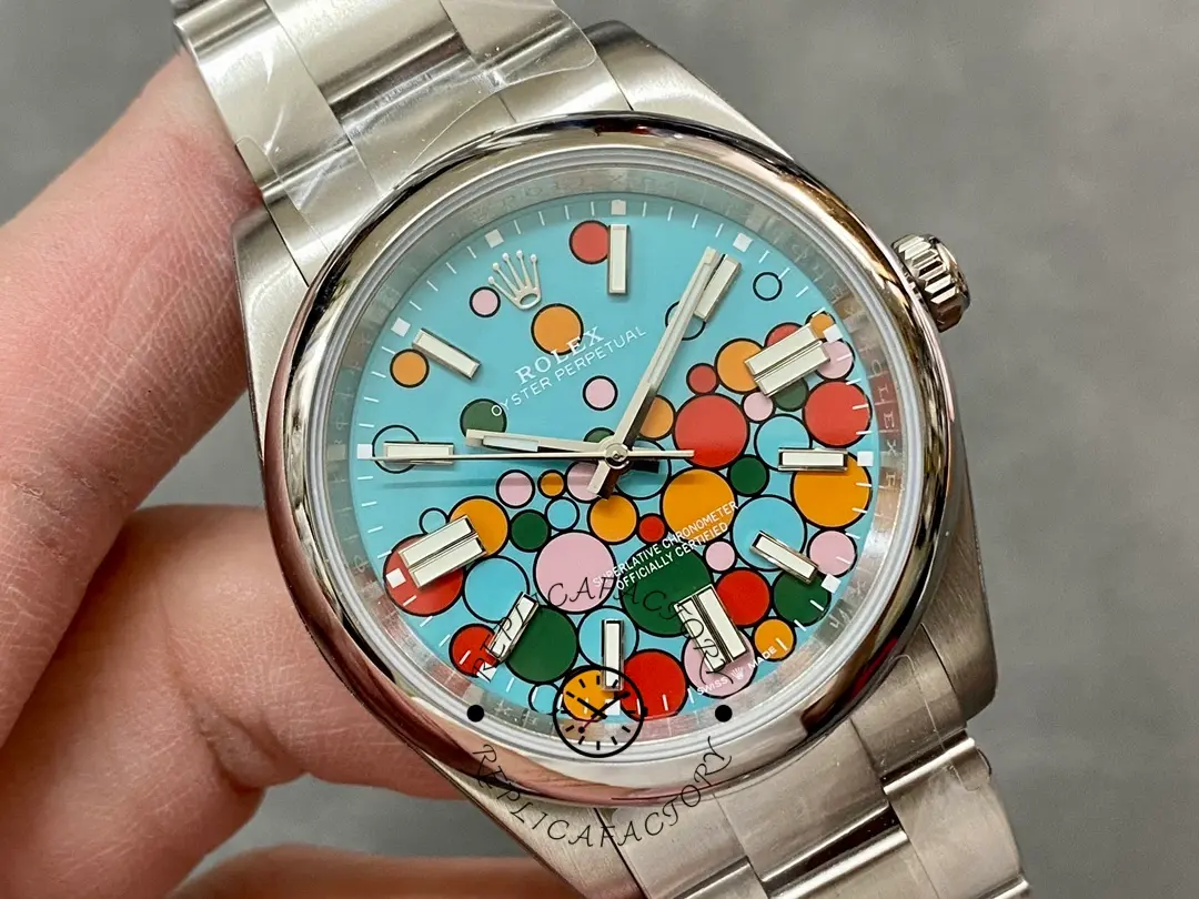 Rolex Oyster Perpetual 41 m124300-0008 held in hand, angled view of balloon dial.