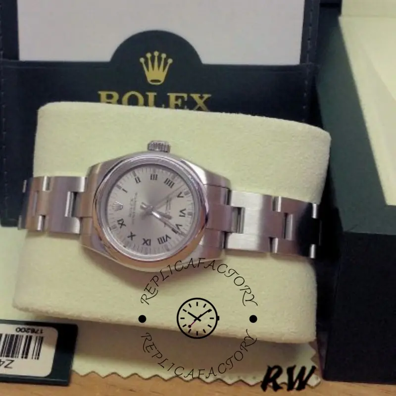 Rolex Oyster Perpetual 176200, box set shot showing watch with Rolex packaging.