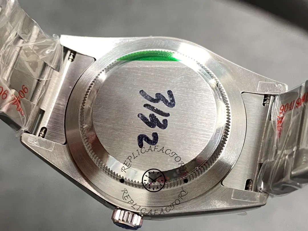 Caseback view of the Rolex Oyster Perpetual 39 114300 0002 showing solid back with sticker.