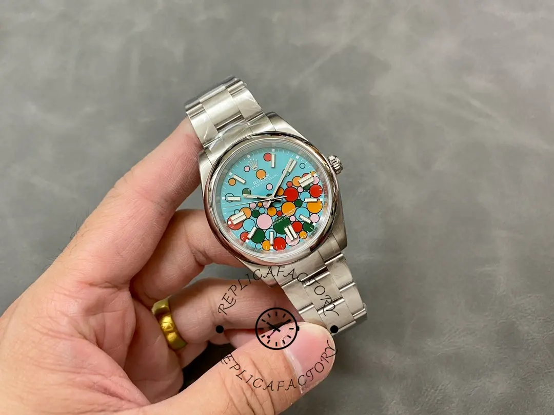 Rolex Oyster Perpetual 41 m124300-0008 full watch view in hand, Oyster bracelet shown.