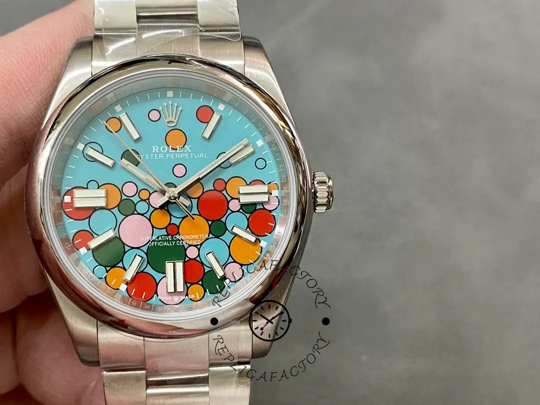 Rolex Oyster Perpetual 41 m124300-0008 held in hand, balloon blue dial, front view.